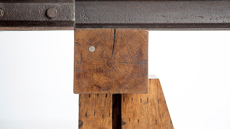 Illustration for article titled Steel and Wood From a Salvaged Railroad Support This Rustic Ping Pong Table